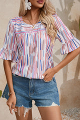 Chemisier blanc à manches mi-longues à rayures multicolores Splash-A WOMAN WE LOVE