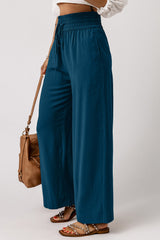 Large casual pants with elastic waist with blue tightening cord