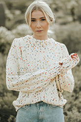 Suéter de cuello redondo en tejido retorcido *