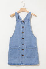 Short denim dress with wide suspenders *