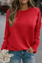 Sudadera roja roja con cuello redondo y mangas de raglán