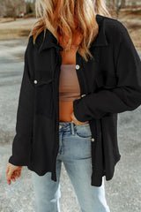 Black relaxed jacket with contrasting flap pockets