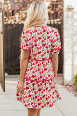 Robe courte à fleurs rouges, manches bouffantes, volants et poches