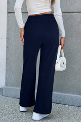 Pantalones de tamaño decretado con cordón apretado forrado como un vellón azul marino sólido