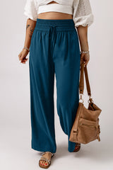 Large casual pants with elastic waist with blue tightening cord