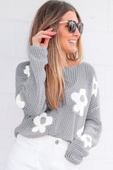 Light gray sweater with drooping shoulders in openwork knitting with large flowers