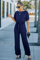 Combinaison bleue à jambe large et ceinture-A WOMAN WE LOVE