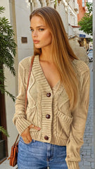 Cardigan texturé beige avec poches avant et boutons *
