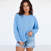 Sudadera con mangas de perlas y hombros caídos, cuello redondo