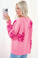 Pink full pink sweater with drooping shoulders and knot pattern