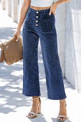 Jean large bleu raccourci à taille haute et boutons devant