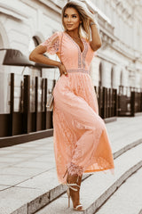 Vestido rosa largo en encaje con gran cantidad con V -necdo