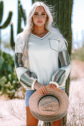 Alto en tejido de tejido incorporado con costuras expuestas y mosaicos de rayas blancas