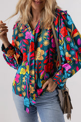 Chemisier vert à manches bouffantes et col fendu avec nœud floral-A WOMAN WE LOVE