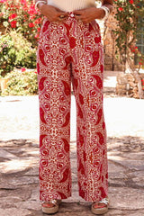 Pantalon droit taille haute boutonné *