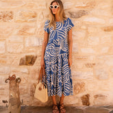 Short-sleeved flared dress with sky blue bohemian print