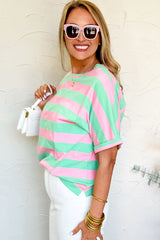 Loose t-shirt with rolled up sleeves and pink stripes