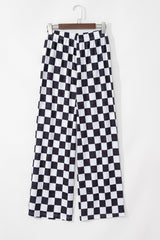 Grandes pantalones de cintura alta negras con baldosas de dos colores *