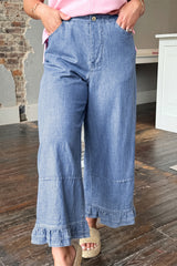Jean large bleu clair grande taille à bas volantés