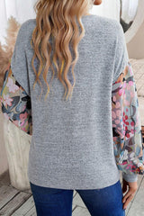 Gray floral top with lantern sleeves, buttoned patchwork, V-neck