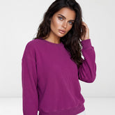 Sweats de gran tamaño en el Velvet Fucsia de terciopelo acanalado