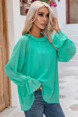 Chemisier vert frappant à manches longues et poignets évasés plissés-A WOMAN WE LOVE