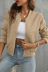 Pale khaki jacket with textured and geometric baseball collar