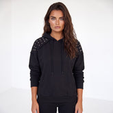 Sweat à capuche noir à manches raglan et rivets décoratifs