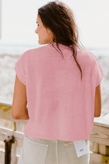 Haut pull rose à manches courtes *