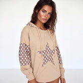 Sudadera con capucha con cordón de apriete de estrellas y albaricoque floral