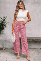 Jean taille haute à jambe large et bord effiloché léopard rose