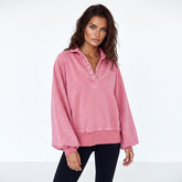 Sweat-shirt oversize rose à manches ballon et col à boutons-pression