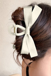Large hair clip with white knot decor