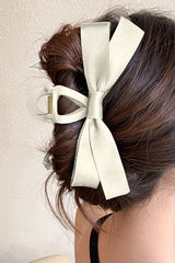 Large hair clip with white knot decor