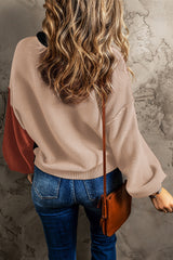 Black sweater with ribbed edge and COLOR BLOCK bishop sleeves