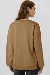 Solid camel fleece lined sweatshirt with dropped shoulders, top and bottom