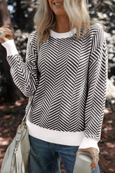 Black sweater with contrasting edges and round neck, falling shoulders