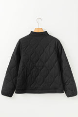 Black quilted jacket with solid color snap buttons