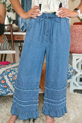 Pantalon large en chambray bleu crépuscule à ourlet volanté