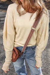 Beige long sleeve patchwork thermal knit top with exposed seams