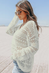 Pull blanc à col en V et crochet ajouré *