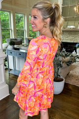 Orange dress with abstract print *
