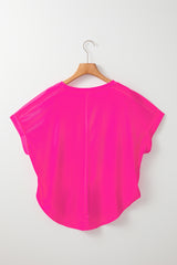 Loose t-shirt with green round hem *