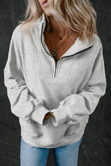 Light gray zipped sweatshirt with high collar and kangaroo pocket