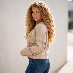 Pull beige à motif écossais et col rond