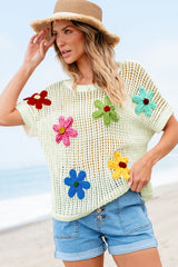 Pull blanc à fleurs en crochet ajouré*