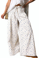 Jean large blanc fleuri à taille haute, double ceinture et cordon