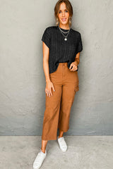 Pull noir à manches courtes et col rond en tricot torsadé