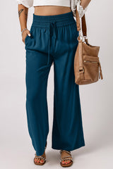 Large casual pants with elastic waist with blue tightening cord