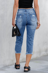 Jean capri skinny bleu ciel délavé à déchirures